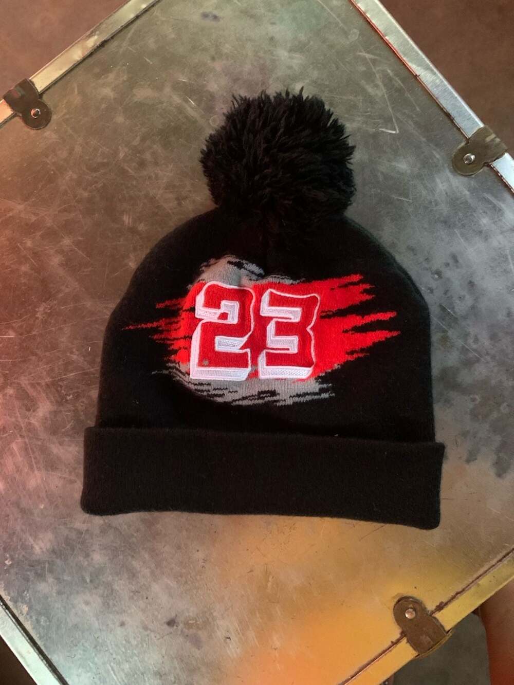 Lion Dynasty 23 Embroidered Pom Beanie Knit Hat Black and Red